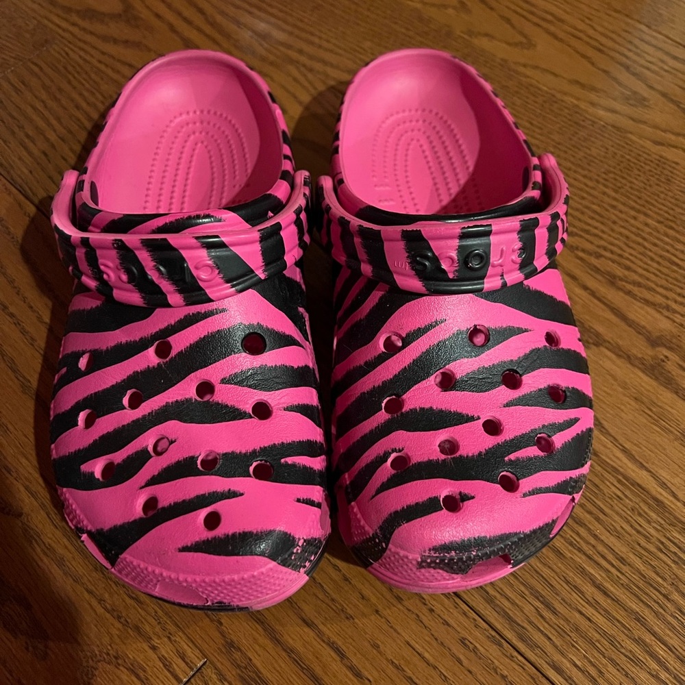 Pink zebra crocs. Size women 8.